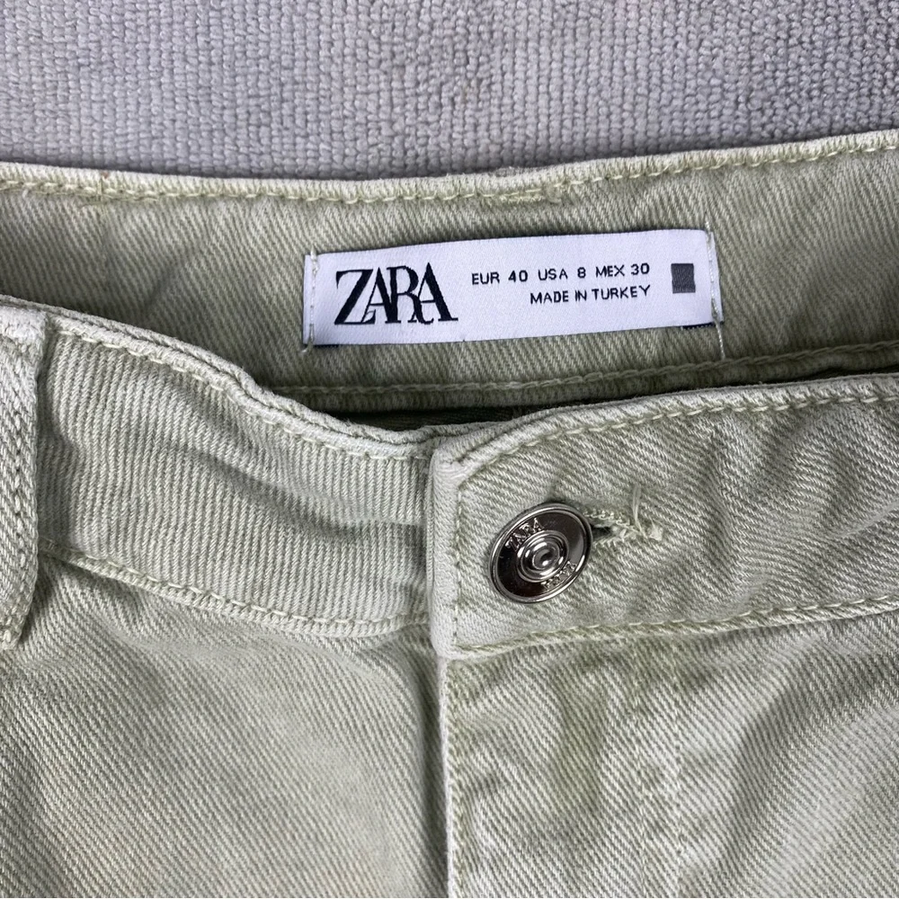 Zara Denim Jeans women Size 8 US. Light Sage Green Distressed Crop Raw Hem